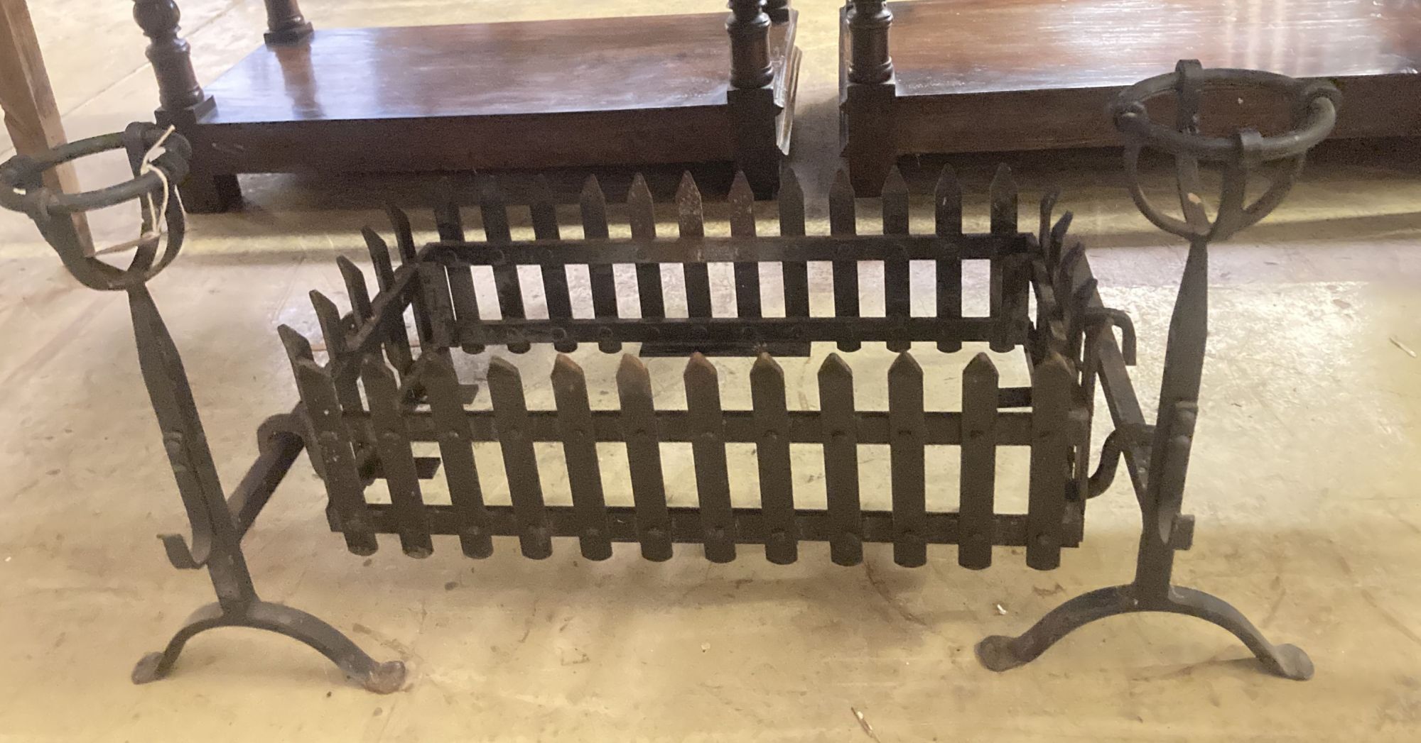 A rectangular wrought iron fire basket, width 96cm, depth 46cm, height 49cm and dogs